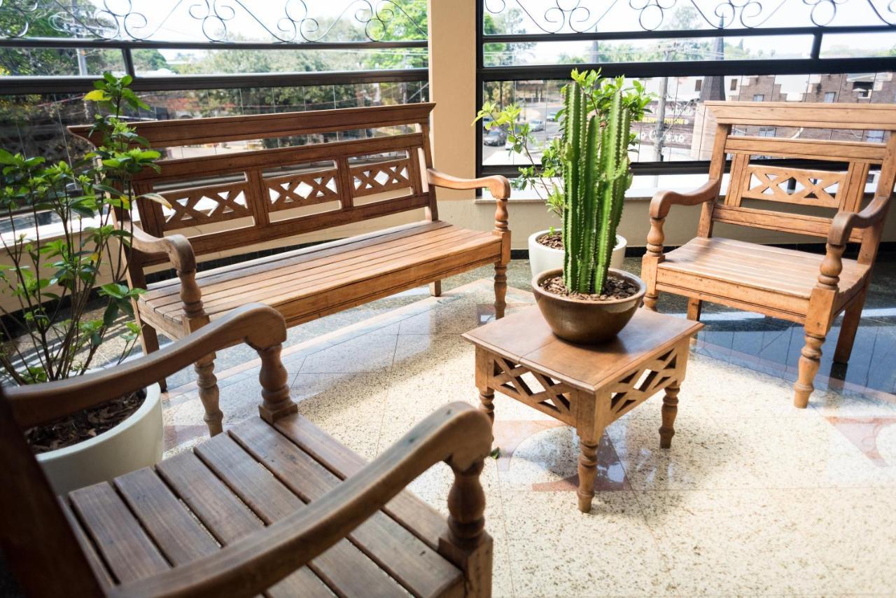 Holambra Garden Hotel Exteriér fotografie A set of Thai style wooden furniture